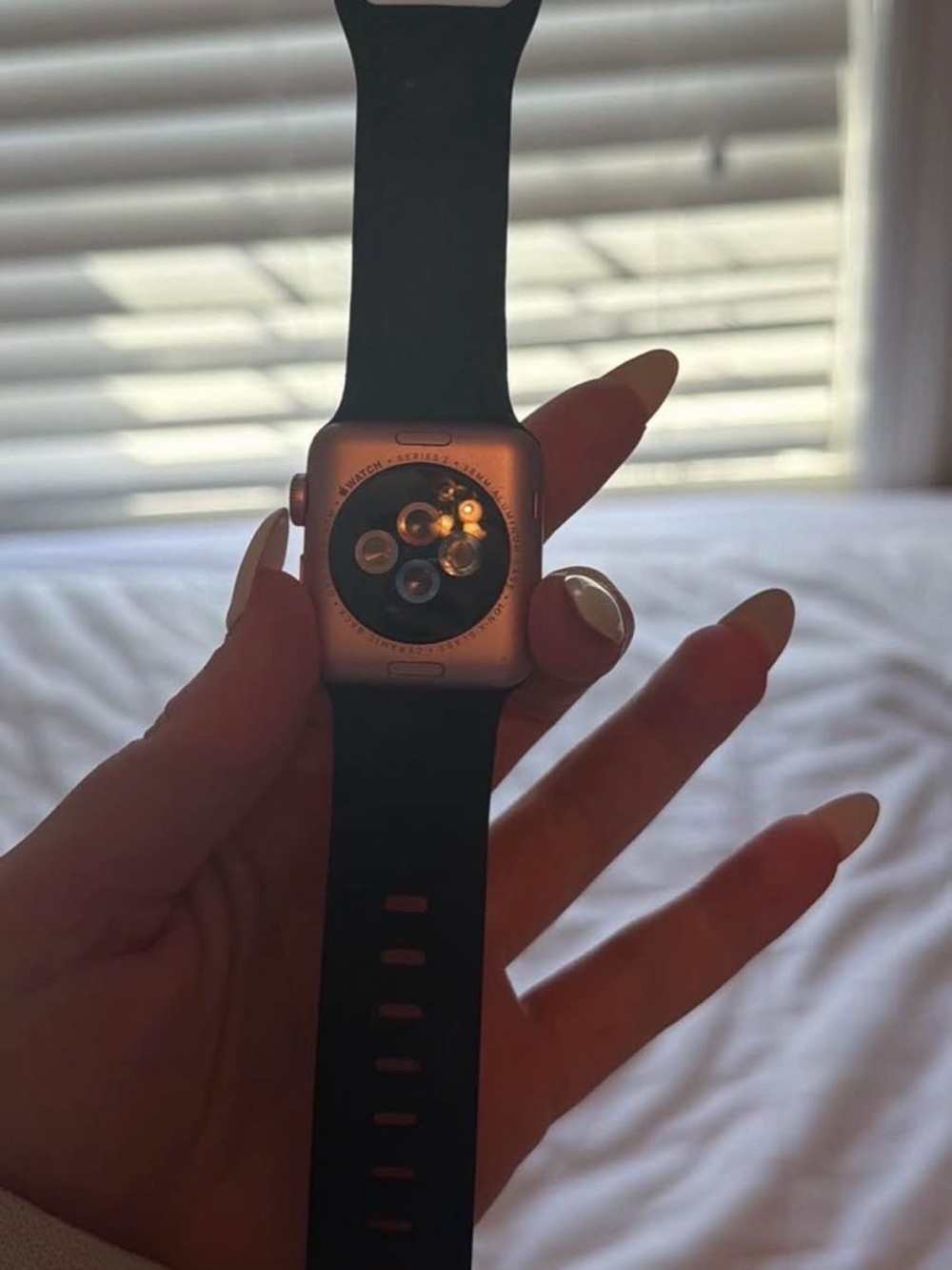 Rose gold Apple Watch series 2 with Black Sport Band